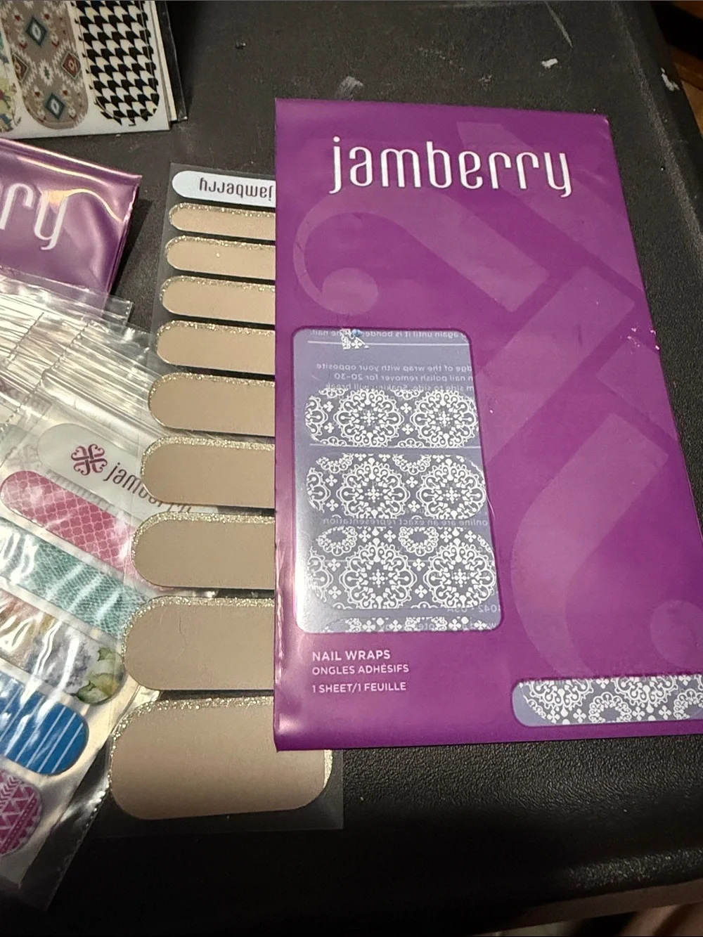 Jamberry Nail Wraps Assorted Styles in Purple Packaging